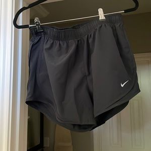 All black Nike shorts.